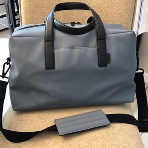 AWAY - Original Everywhere Bag - Coastal Blue with black leather accents.